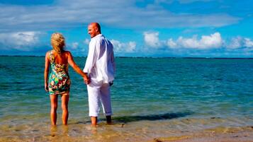 On the beach, sun loungers, beach towels
