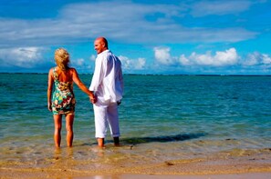 On the beach, sun loungers, beach towels