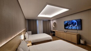 Family Room | Desk, blackout drapes, free WiFi, bed sheets - World Tourist Hotel (Pyeongtaek)