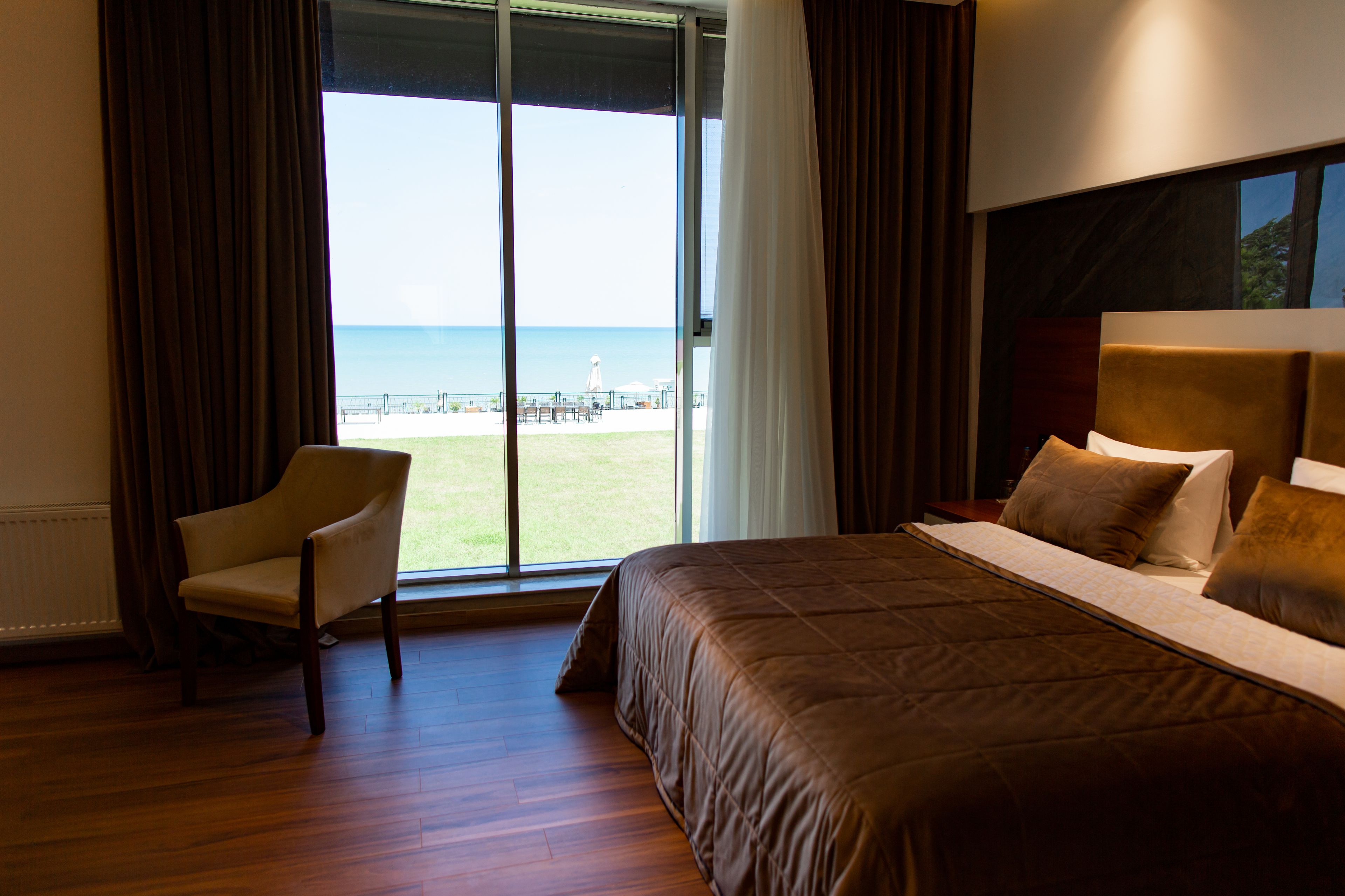 Familie vierpersoonskamer | Uitzicht op strand/zee