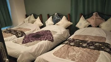 Family Room for 3 People, Non-Smoking | Down comforters, free WiFi