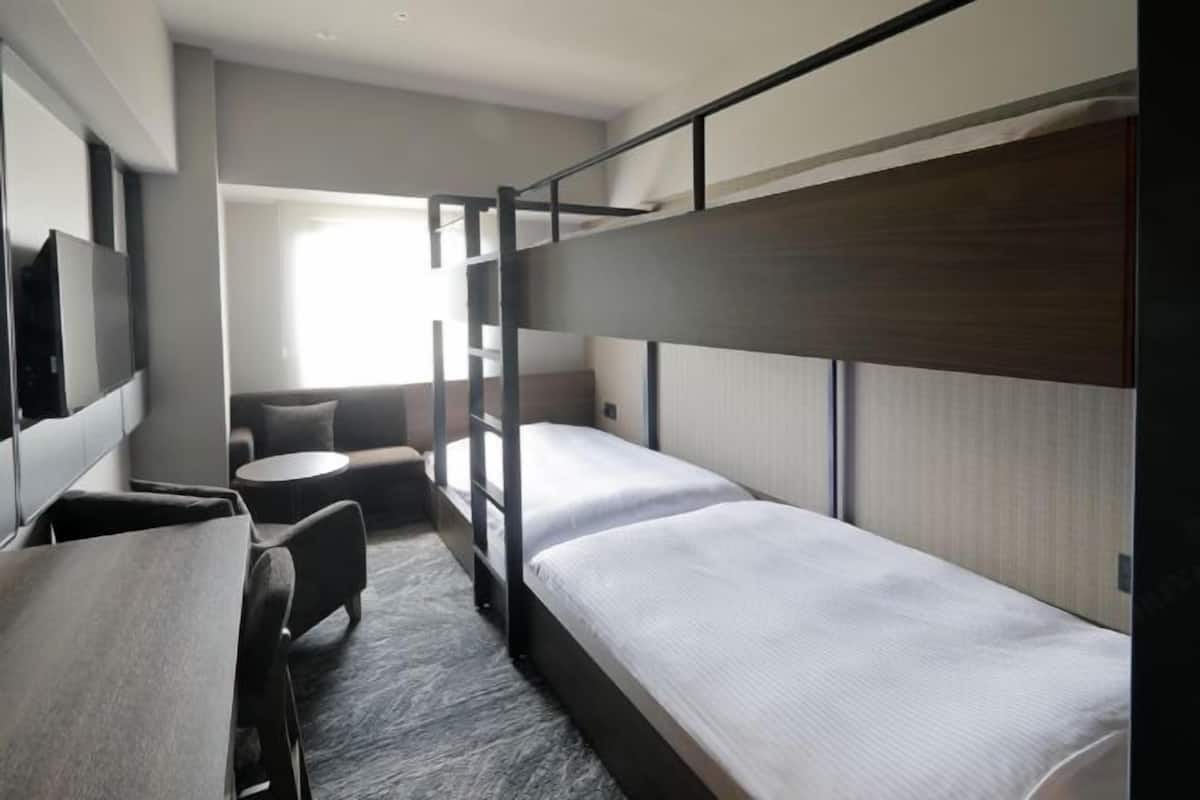 Roupas de cama premium, quartos à prova de som, Wi-Fi de cortesia