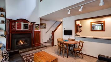 Apartment (2 Bedrooms) | Living room | Fireplace, ping pong