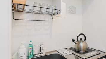 Fridge, stovetop, cookware/dishes/utensils