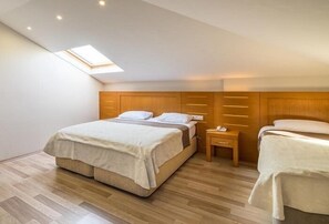 Minibar, coffres-forts dans les chambres, décoration personnalisée