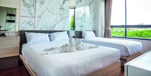 Deluxe Room | Meja kerja, tirai kedap cahaya, dan Internet kabel gratis
