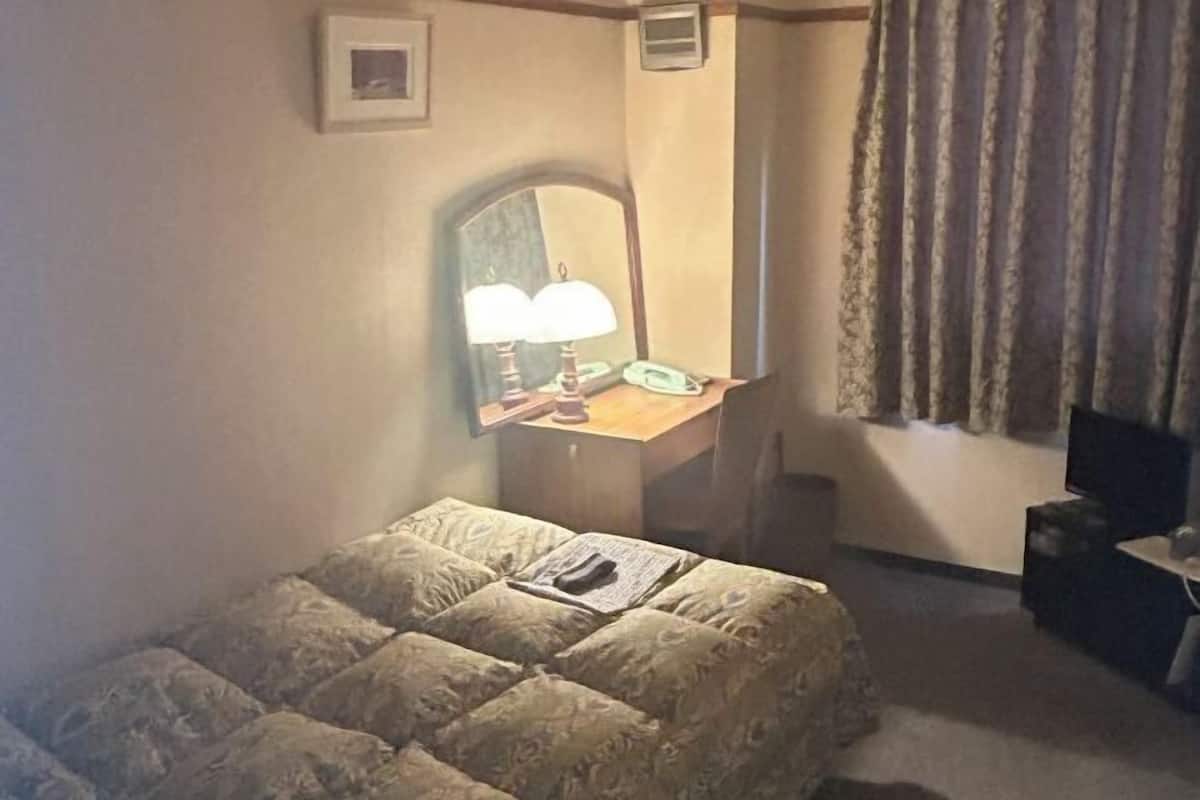 Escrivaninha, quartos à prova de som, Wi-Fi de cortesia