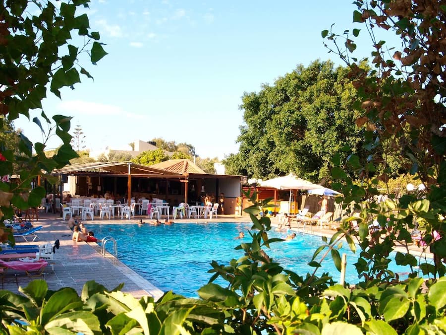 Seasonal outdoor pool, open 10:00 AM to 7:00 PM, pool umbrellas