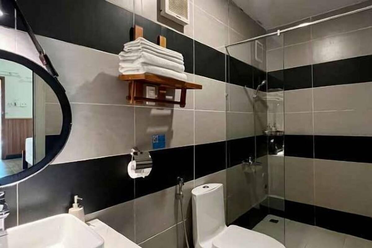 Bathroom | Shower, rainfall showerhead, designer toiletries, hair dryer