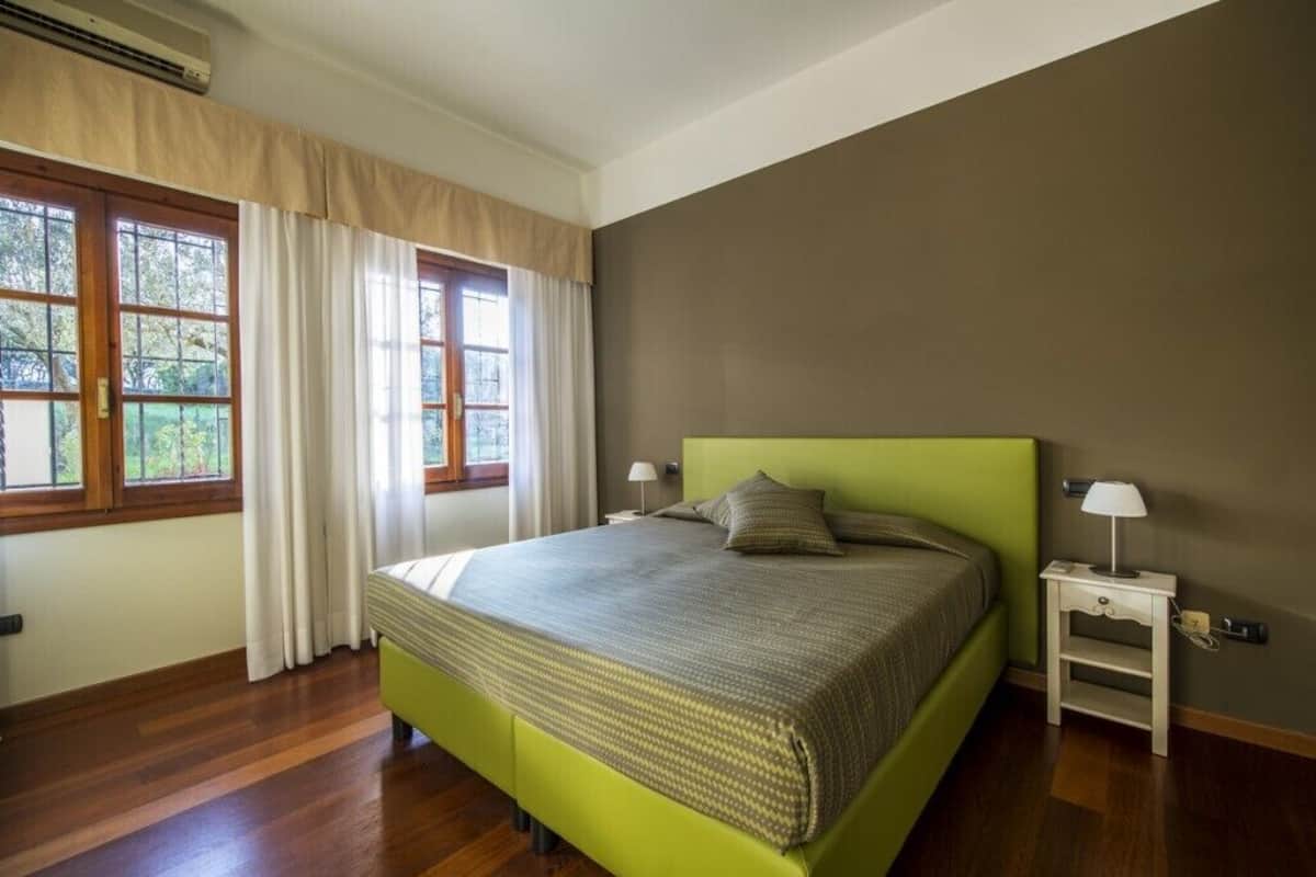 Condo Exclusive, 3 phòng ngủ | Chăn bông, minibar, két bảo mật tại phòng, bàn 