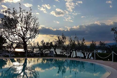 Seasonal outdoor pool, pool loungers