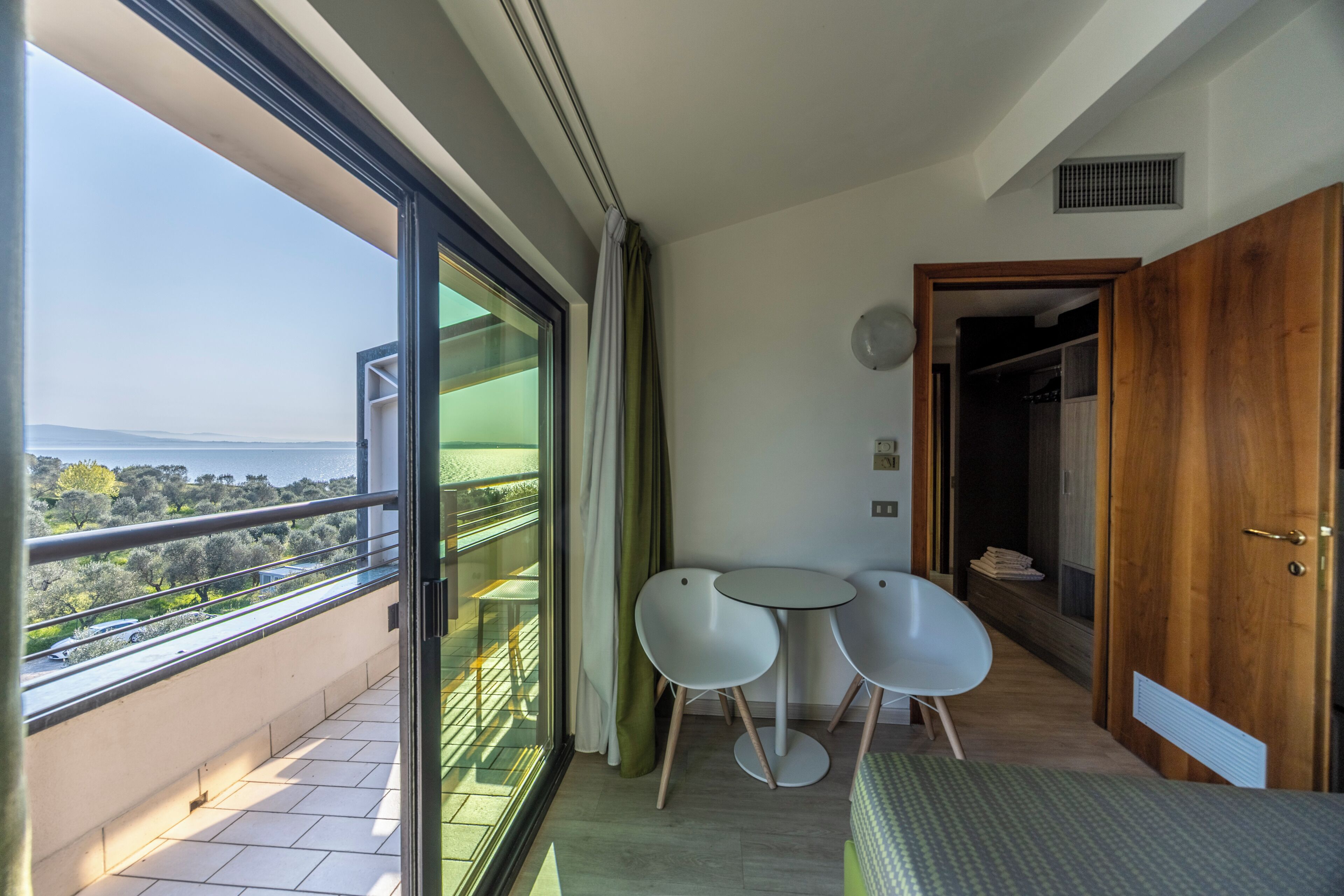 family suite, balcony, lake view | 1 bedroom, down duvets, minibar, in-room safe