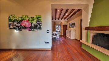 Exclusive Condo, 3 Bedrooms | Living area | Flat-screen TV