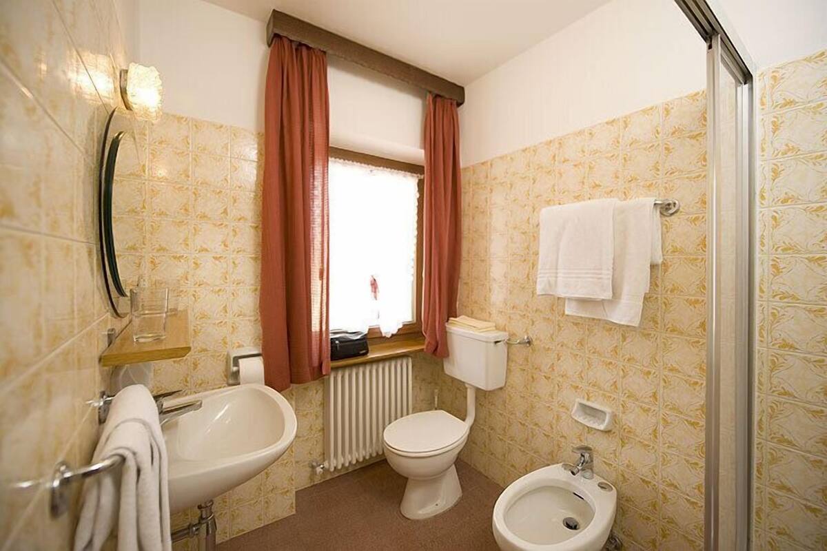 double room | bathroom | shower, rainfall showerhead, hair dryer, bidet
