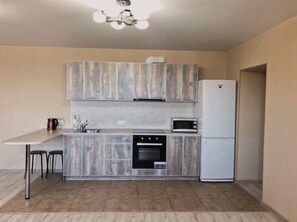 Apartment, 1 Bedroom (14) | Private kitchen - Zolotoy Klyuchik ApartHotel (Vladivostok)
