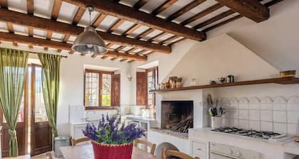 Casale Oliva in a landscape of oaks, olives and cherry trees.