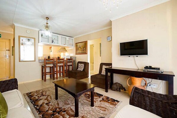 Apartment, 2 Bedrooms | Living area | Flat-screen TV