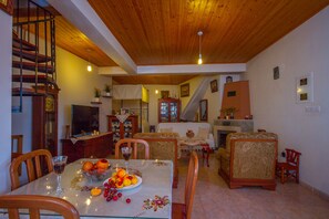 Cottage | Living area | Flat-screen TV, fireplace - Aethra Cottage (Pelentri)