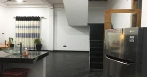Vila econômica, várias camas, para não fumantes, vista para o jardim | Cozinha compartilhada