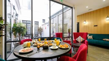 Daily buffet breakfast (EUR 14 per person)