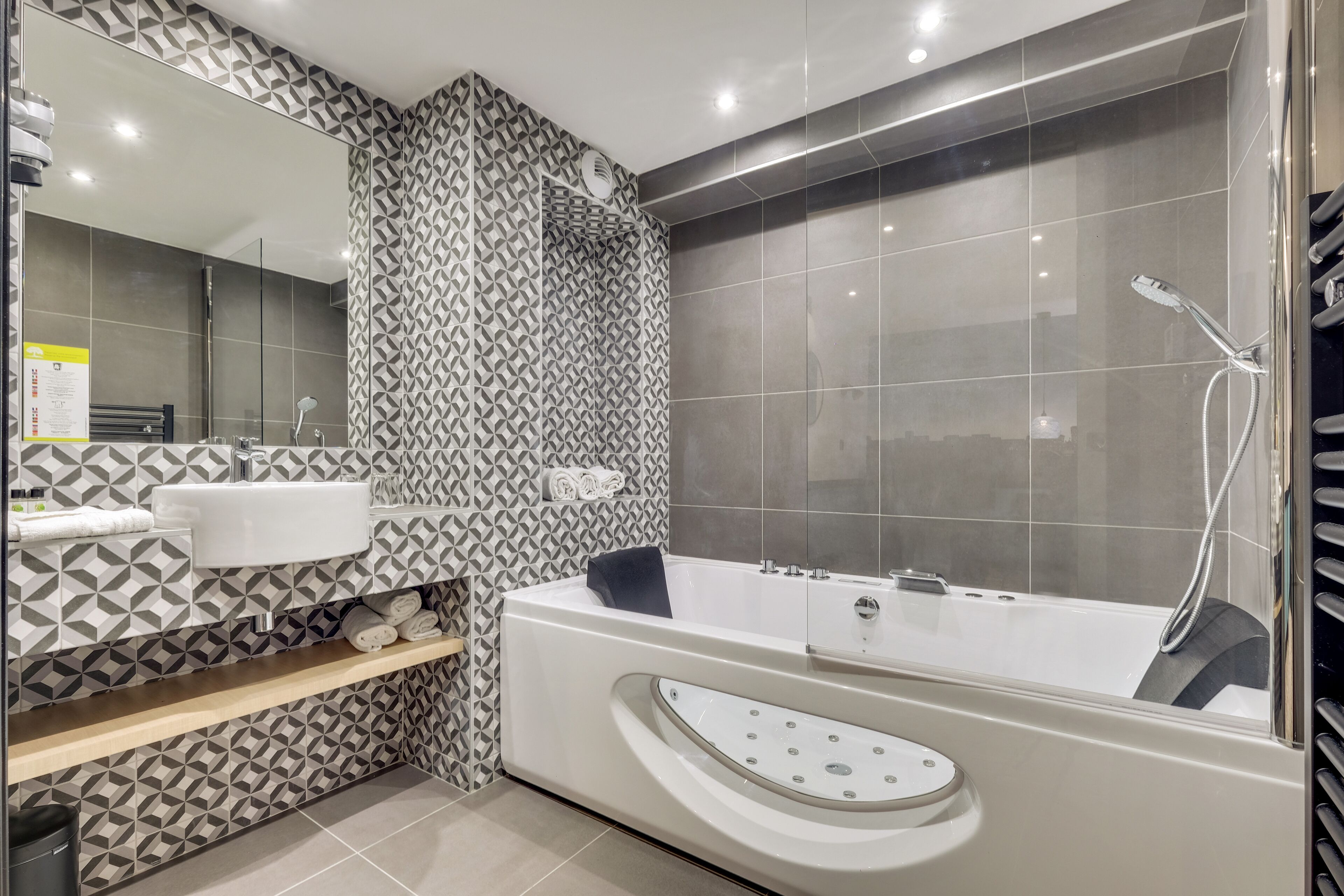 superior triple room, jetted tub | bathroom | free toiletries, hair dryer, towels