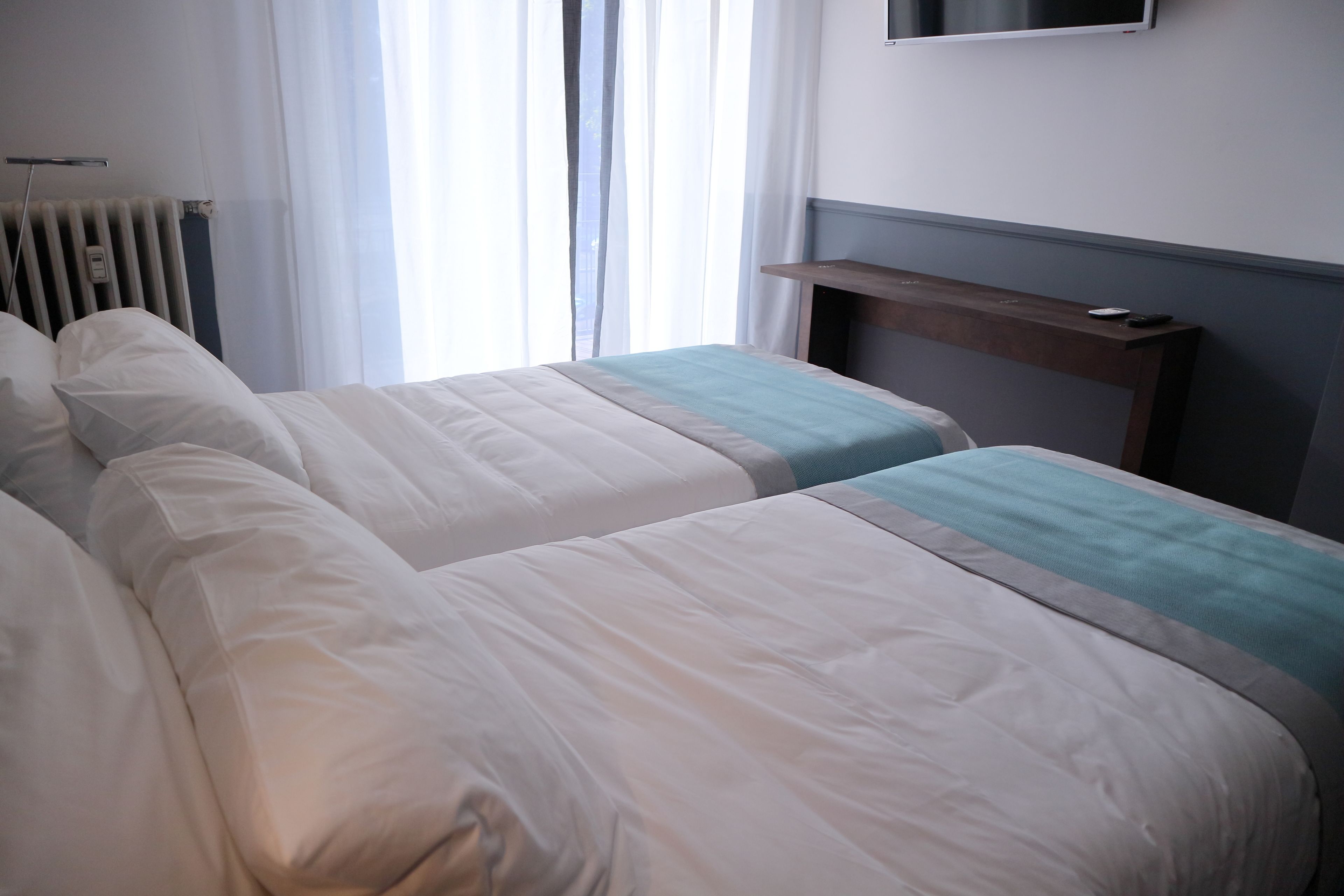 Camera Standard con letto matrimoniale o 2 letti singoli | Cassaforte in camera, una scrivania, postazione laptop, insonorizzazione