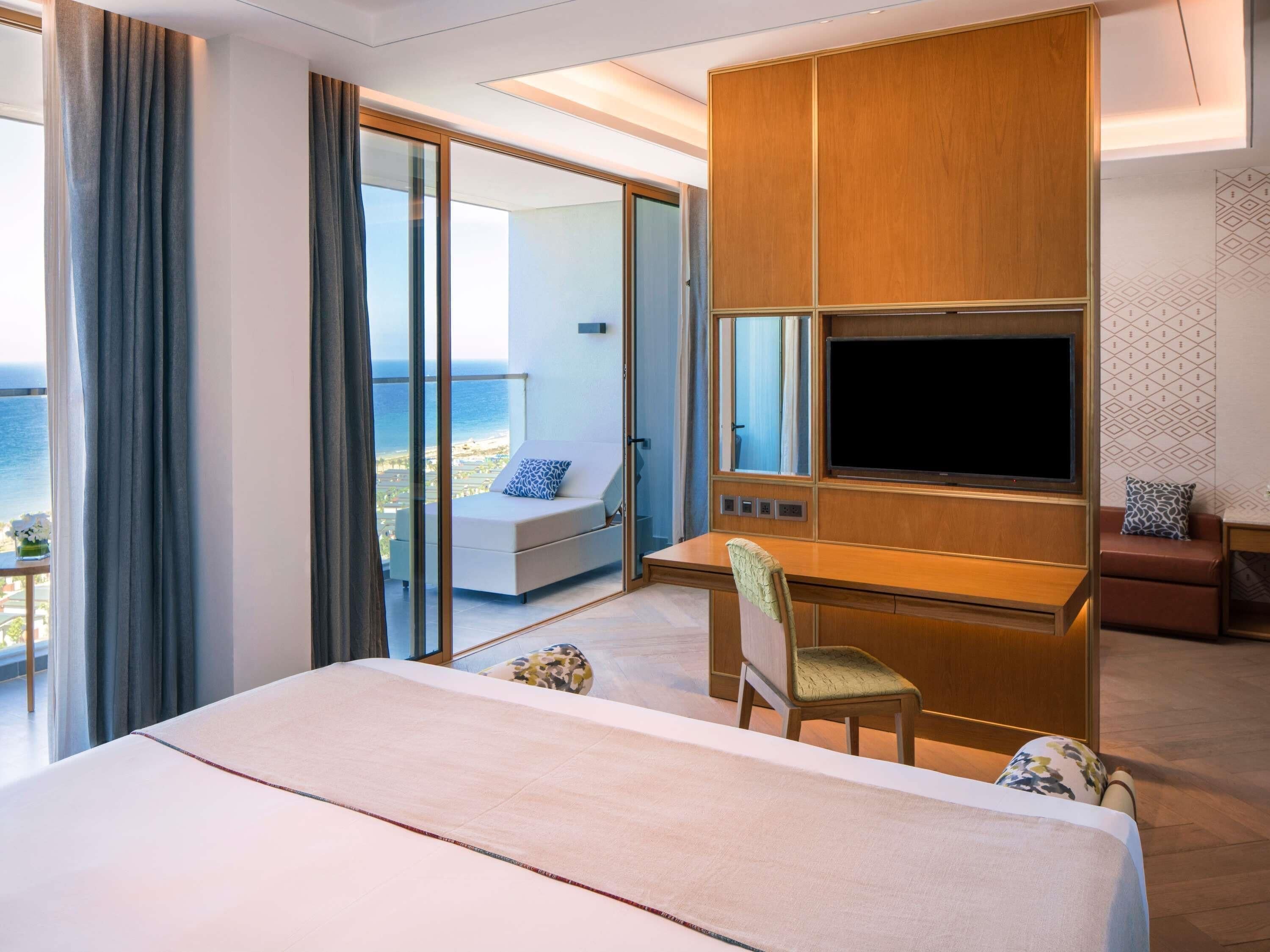 Premium bedding, down comforters, minibar, in-room safe