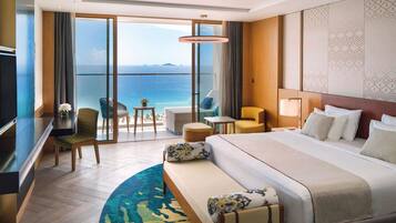 Habitación Deluxe, 1 cama King size, vista al mar | 1 habitación, ropa de cama de alta calidad, edredón y minibar