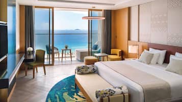 Deluxe kamer, 1 kingsize bed, uitzicht op zee | 1 slaapkamer, luxe beddengoed, donzen dekbedden, een minibar