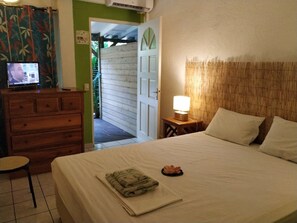 Bungalow Signature, en la zona del jardín (2) | Ropa de cama de alta calidad y decoración individual