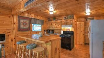 Cabin | Private kitchen | Fridge, microwave, stovetop, dishwasher