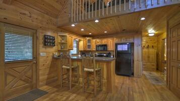 Cabin | Private kitchen | Fridge, microwave, stovetop, dishwasher