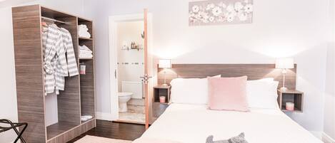 Deluxe Family Room | Hypo-allergenic bedding, desk, blackout drapes, iron/ironing board