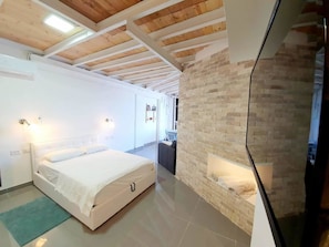 Suite Studio Deluxe | Literie de qualité supérieure, décoration personnalisée, draps fournis