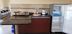 Casa, 3 habitaciones | Cocina privada | Refrigerador, microondas, horno y parrilla de estufa 