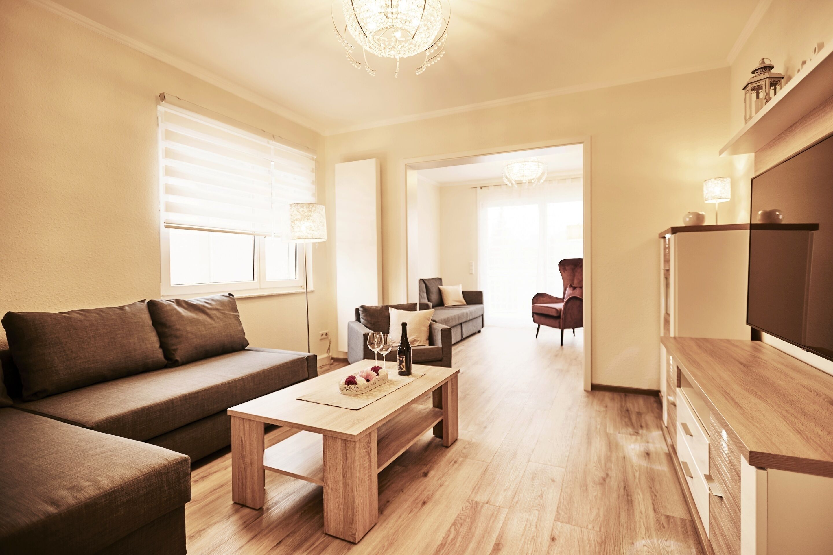 Deluxe Apartment, 2 Bedrooms, Balcony | Living room | 65-inch flat-screen TV with satellite channels, Smart TV, Netflix