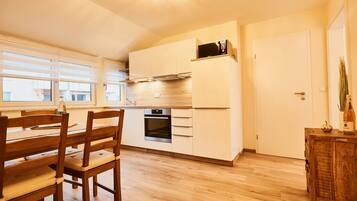 Exclusive Penthouse (Suite) | Private kitchen | Full-sized fridge, microwave, oven, stovetop