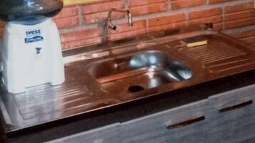 Fridge, microwave, cookware/dishes/utensils