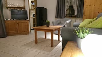 Apartemen Keluarga (including final cleaning fee 59 EUR) | Area keluarga | Televisi layar datar 35-inci dengan saluran TV satelit dan TV