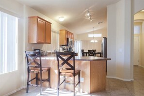 House (3BR Mesa Home) | Private kitchen | Shared fridge, microwave, coffee/tea maker, cookware/dishes/utensils - 4353 Mesa (Mesa)