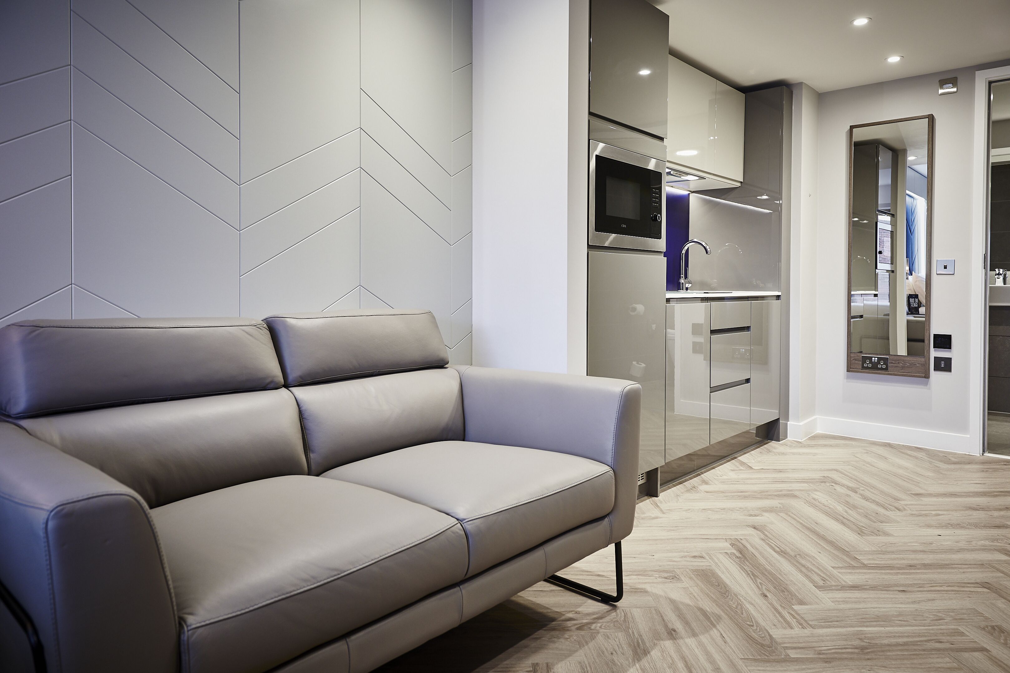 smart studio | living area | flat-screen tv