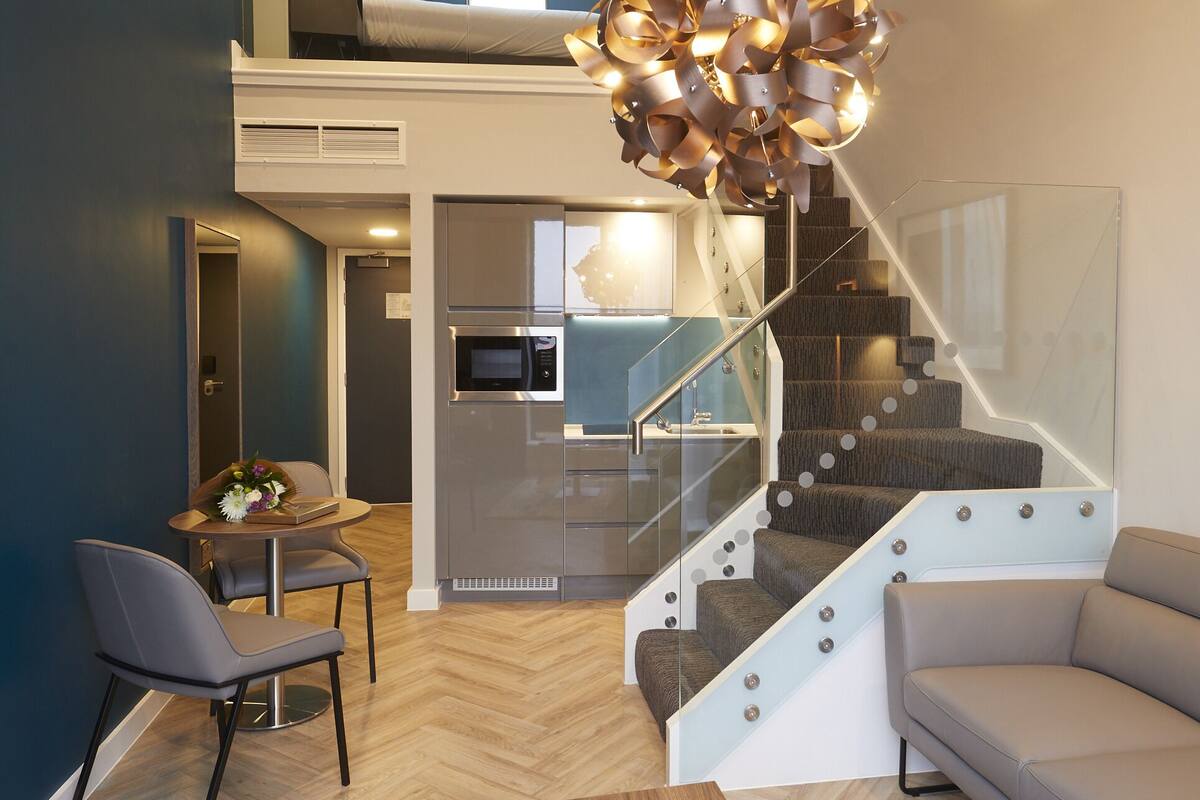 loft suite balcony | living area | flat-screen tv