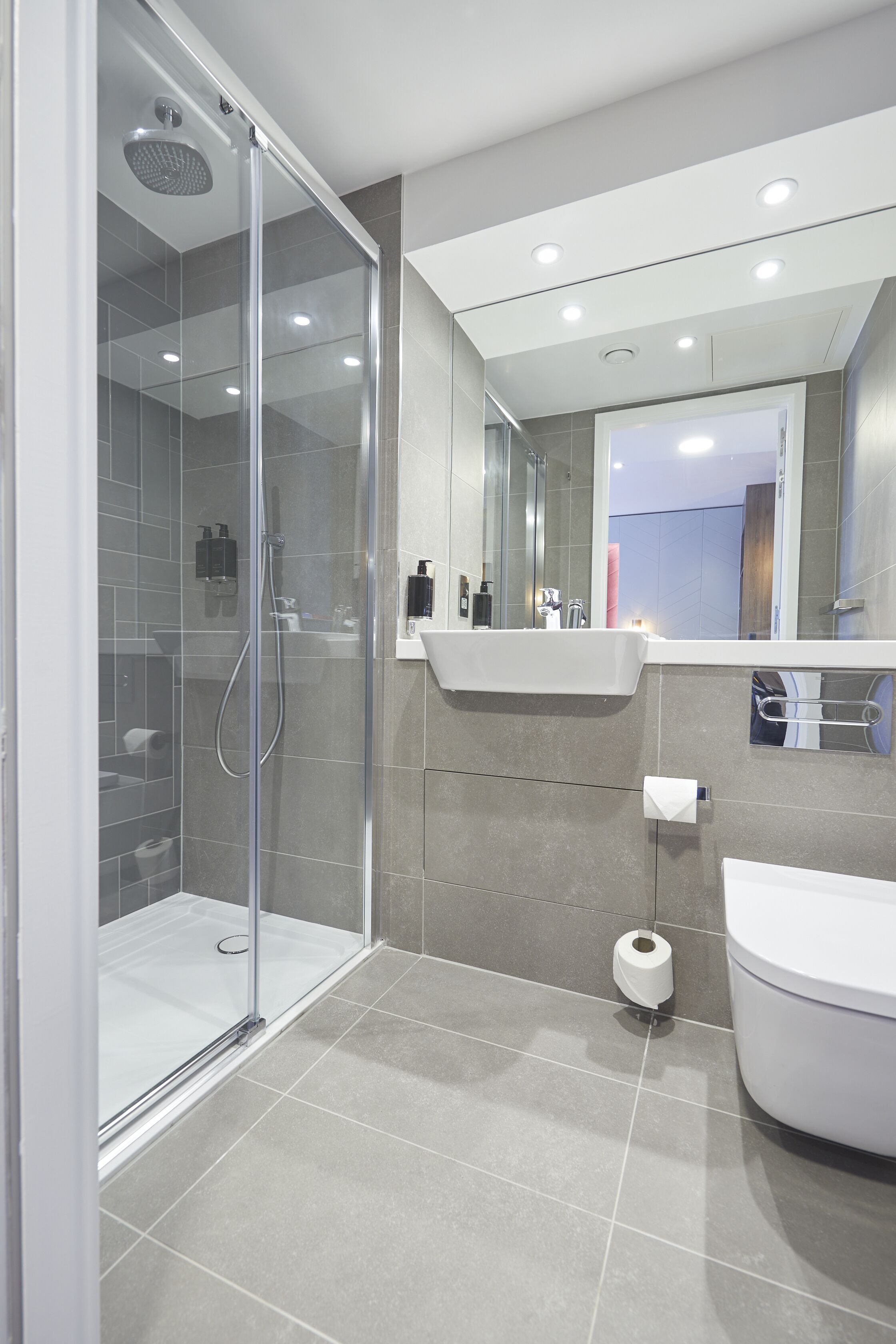 shower, rainfall showerhead, designer toiletries, hair dryer