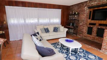 Traditional Cottage | Living area | 42-inch Smart TV with premium channels, TV, first-run movies