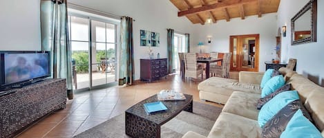 Flat-screen TV, DVD player, ping pong