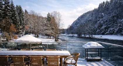 Beautiful waterfront house with heated indoor pool, sauna, terrace.