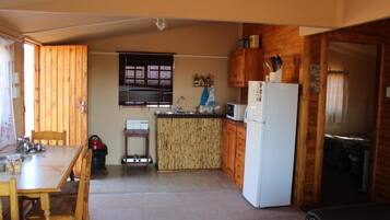 Fridge, microwave, toaster, cookware/dishes/utensils