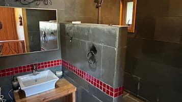 Bathtub, hair dryer, towels, soap