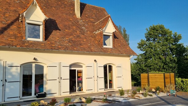 A two-story house with a swimming pool, white shutters, and a garden with rocks and plants. - Holiday Home in Blis et Born, Near  Perigueux, Dordogne - Large Heated Swimming (Bassillac Et Auberoche)