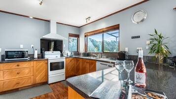 Coffee/tea maker, fridge, microwave, oven